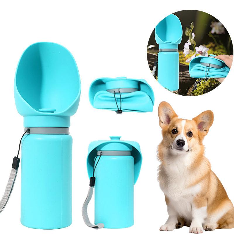 Folding pet water bottle in use during outdoor walk - Blue